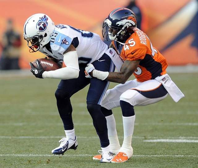 Dominique Rodgers-Cromartie tackles the Titans' Nate Washington in a game in Denver in December. the former TSU defensive back will play in Super Bowl XLVII and is one or more than a dozen players and coaches with ties to the region. / file / AP