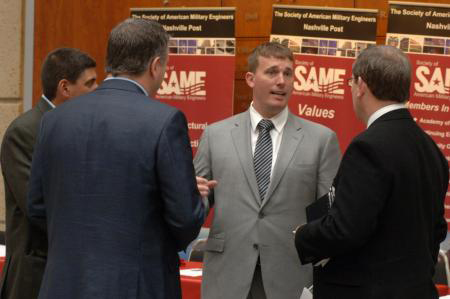Medal of Honor recipient Marine Sgt. Dakota Meyer (center) talks with participants during a break at the 3rd Annual Small Business Training Forum at the Tennessee State University, Avon Williams Campus, in Nashville, Tenn., March 13. Sgt. Meyer is currently the president of Dakota Meyer Enterprises Incorporated and most recently received his first federal contract from the Corps of Engineers. (photo by Leon Roberts, U.S. Army Corps of Engineers, Nashville District)
