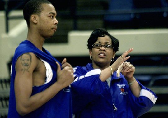 Tennessee State University Athletic Director Teresa Phillips talks with Jeremy Jackson during the men's team practice on Feb. 12, 2003. (Photo: Ricky Rogers, The Tennessean)