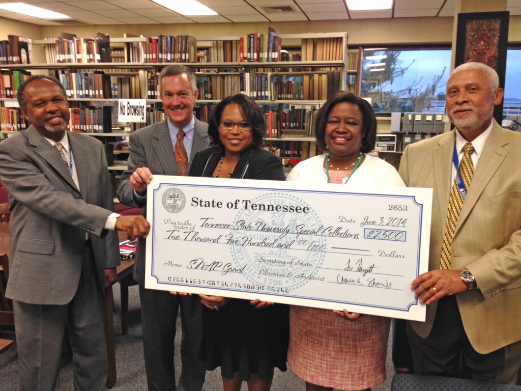 Administrators from Tennessee State University accept a check from Tre Hargett (second from left) Tennessee Secretary of State to help with archiving materials in the special collections at the Brown-Daniel Library. The SNAP grant is seed money to help preserve the papers of civil rights leader Avon Williams. Accepting the grant are (L-R) Fletcher Moon, associate professor and head Reference Librarian; Dr. Lesia Crumpton-Young, associate Vice President for Research and Sponsored Programs; Dr. Alisha Mosley, associate Vice President for Academic Affairs; and Dr. Murle Kenerson, interim Dean of Libraries. (photo by Rick DelaHaya, TSU Media Relations)