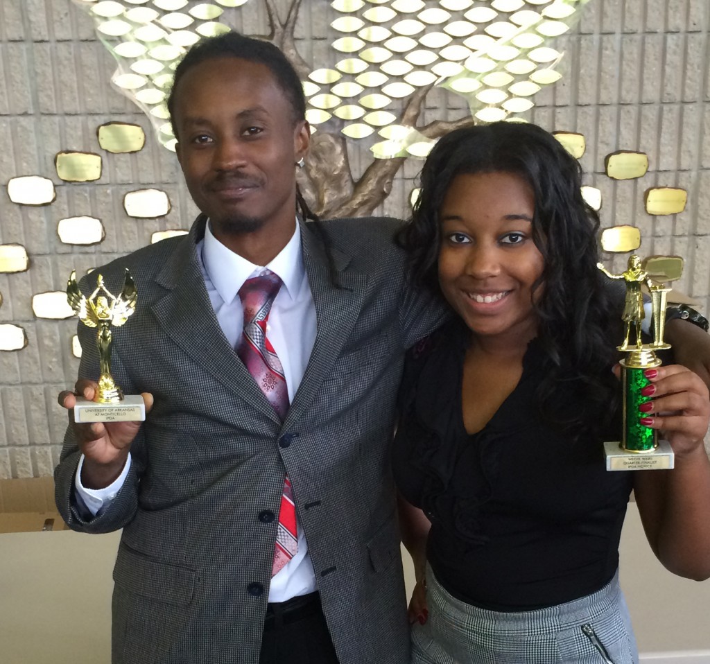TSU forensics debaters, Ricky Madden (L) and Barbara Dudley , advanced to elimination rounds in the Novice division of the Weevil Wars debate tournament held at the University of Arkansas. It was the debate team's first tournament of the year where they competed against more than 100 students from 15 different universities. (courtesy photo)