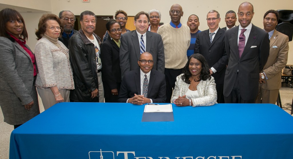 President Glenda Glover and Van Pinnock, of the Footprint Collaborative, signed the Memorandum of Understanding at a ceremony in Jane Elliott Hall on the main campus Thursday, as University, state and local officials, as well as representatives of the various neighborhood groups watch.