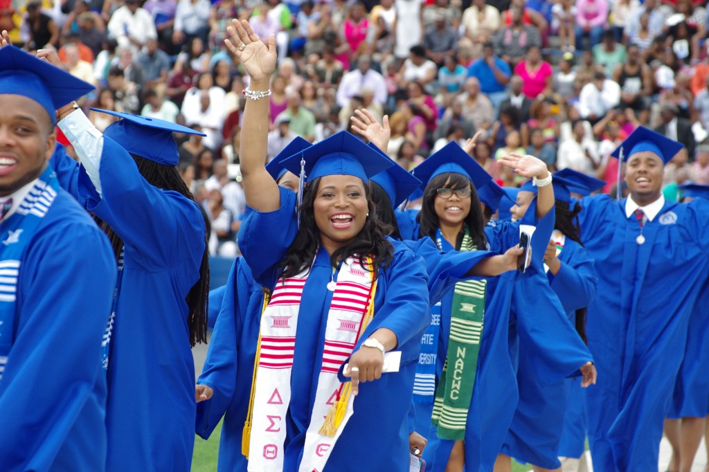 Students enter Hale Stadium at the start of Spring Commencement 2014. More than 1,100 students received their degrees in various disciplines including 827 students earning undergraduate degrees, 353 receiving graduate degrees and graduate certificates, along with 71 doctoral candidates. (photo by Rick DelaHaya, TSU Media Relations)