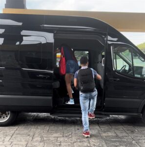 Students Entering a Van